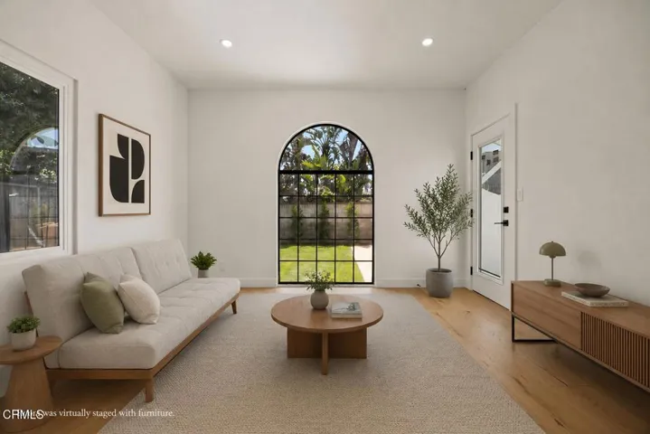 Unit 1 living room. Virtually staged 934