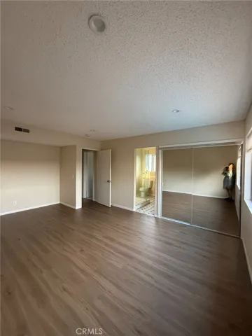 Master bedroom closet and door to master bath