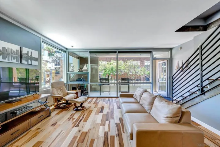 Gorgeous open kitchen floorplan- floor to ceiling windows captures  the heart of ballpark district. Beautiful  Brazilian hardwood flooring throughout!