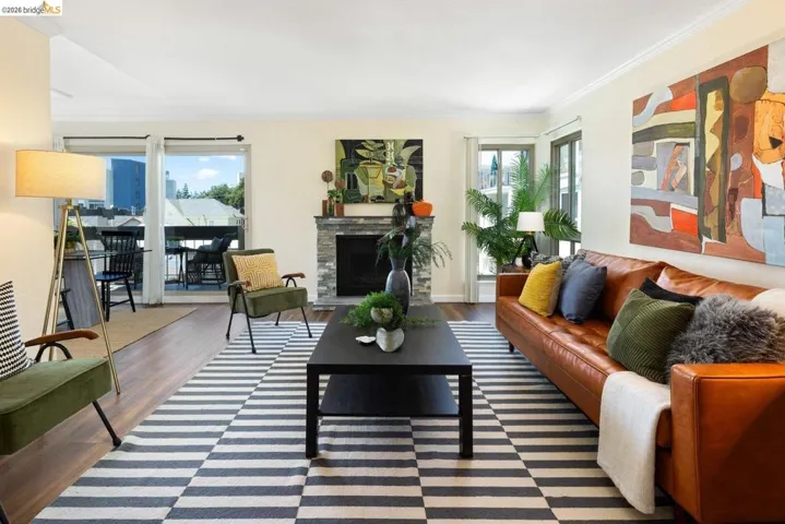 77 Fairmount Ave., No. 302, Oakland CA for sale. End unit, 2 bedroom, 2 bathroom (one en suite), fireplace, balcony overlooking the pool, parking. Recently updated, ready to move in.