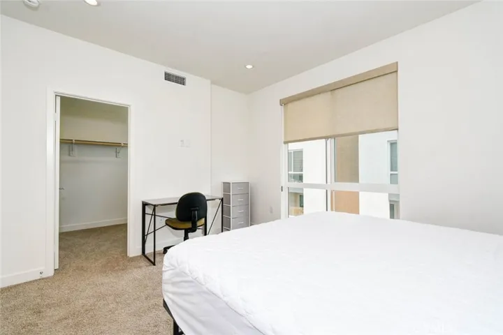 The primary bedoom on the third floor is generous sized with a walk-in closet.
