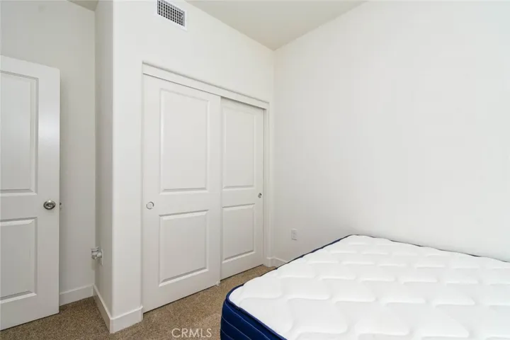 The second bedroom has the closet space.
