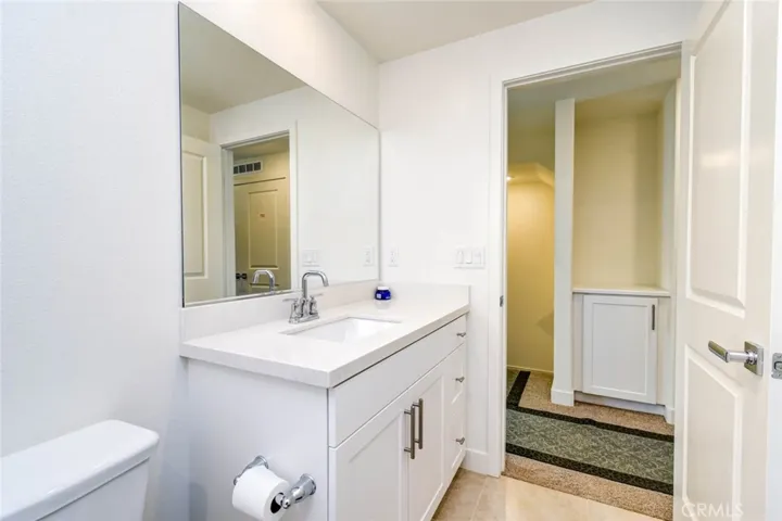 Another view of this hall way bathroom.