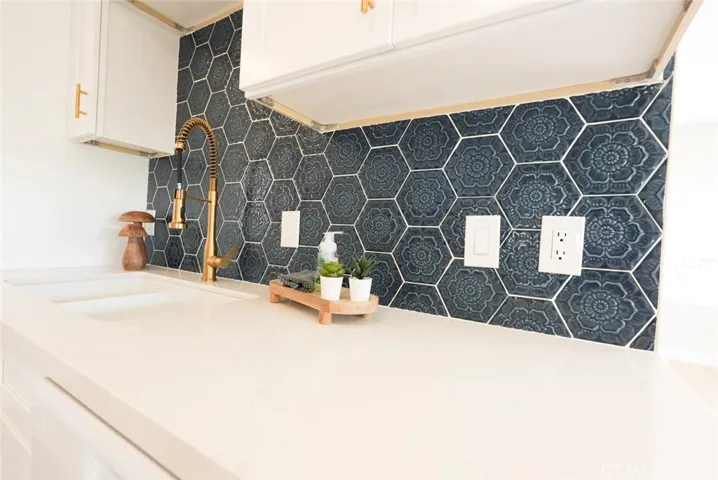 Quartz counter tops, tile backsplash