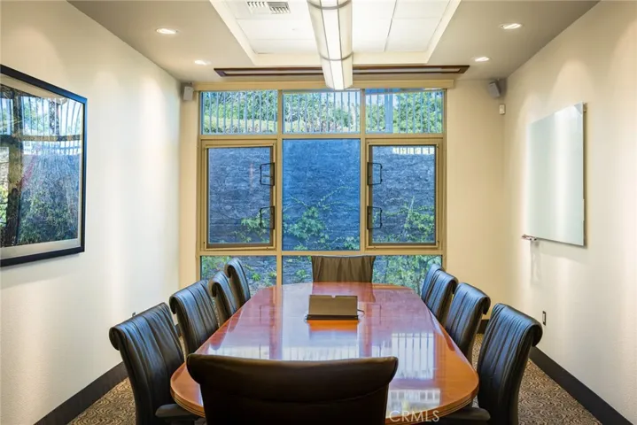 Main conference room looking towards outdoor patio area