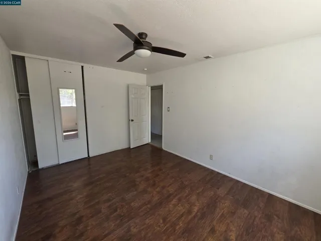 View of bedroom 2 from the side where the window is.