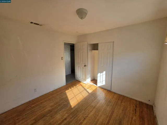 VIEW OF CLOSET IN BEDROOM 1