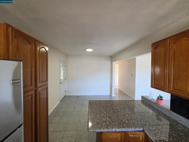 VIEW OF DINING AREA FROM KITCHEN