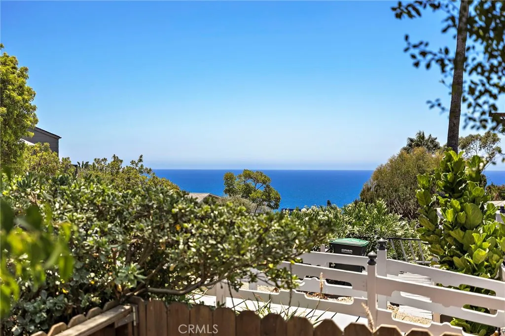 Patio located off the primary bedroom with ocean views.