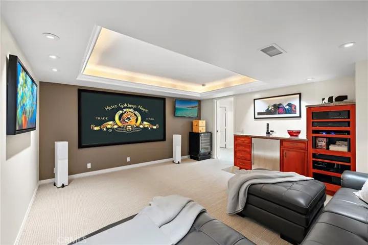A flexible bonus room with custom built-ins is currently enjoyed as a media room and offers a dedicated space for movie nights.