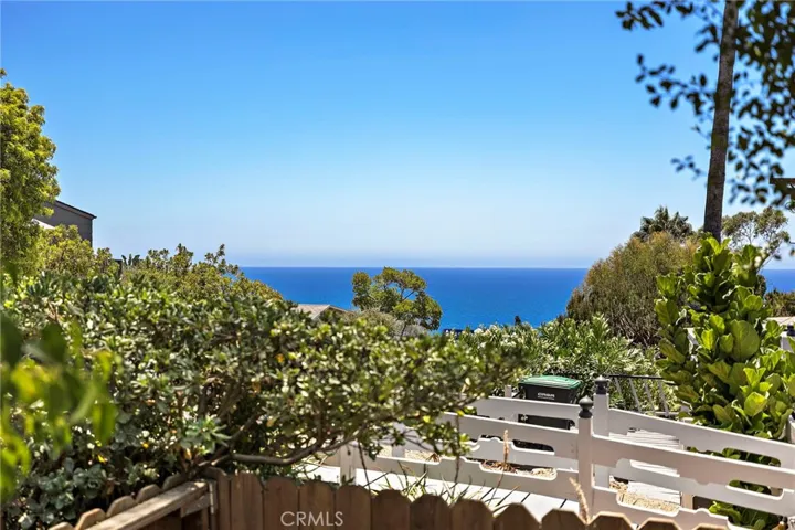 Patio located off the primary bedroom with ocean views.