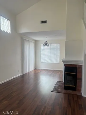 Entry looking into living room & dining area 
