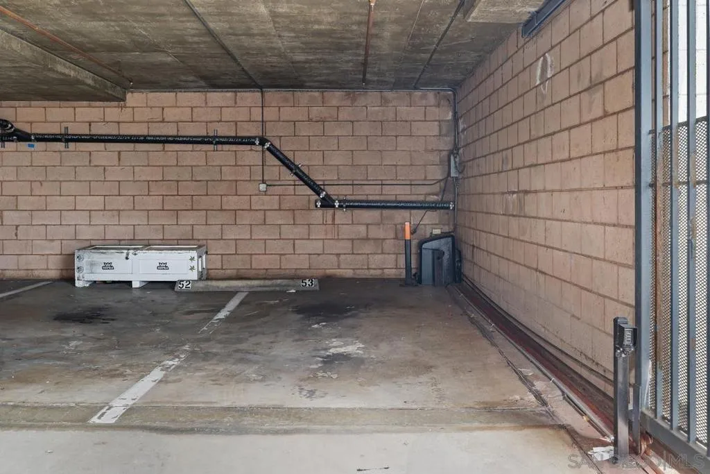 The unit has parking space #53 which is located right next to the entry gate.