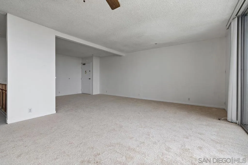 Looking across the living room to the entry area of the home.