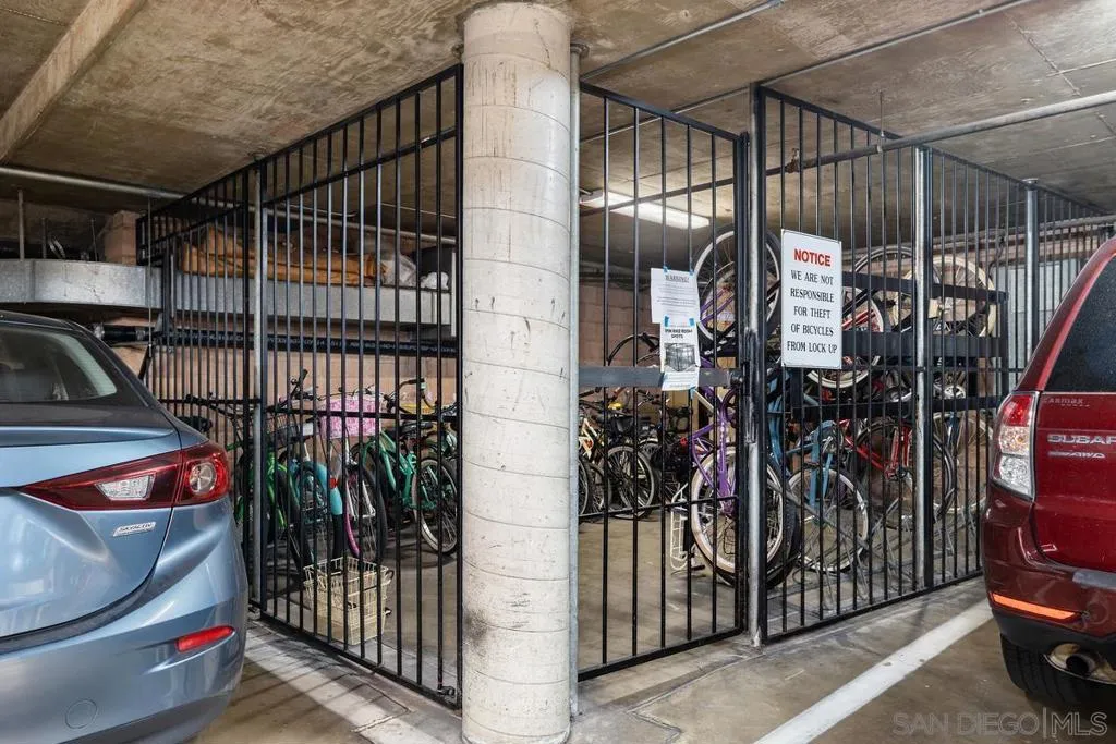 The community bike storage cage is located in the underground garage near the laundry room.