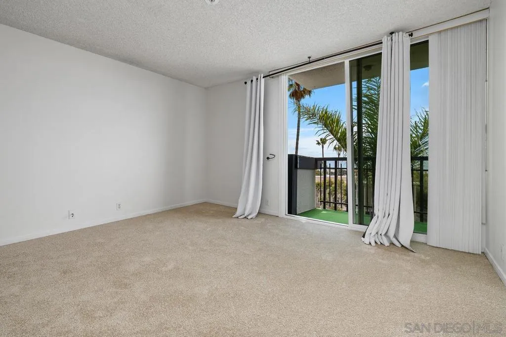 The large Primary Bedroom has fresh paint and new carpet.
