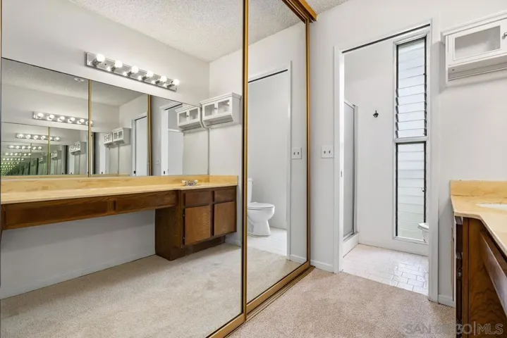 The Primary Bedroom has a massive closet across from the huge vanity.