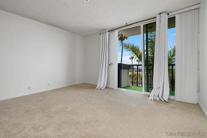 The large Primary Bedroom has fresh paint and new carpet.