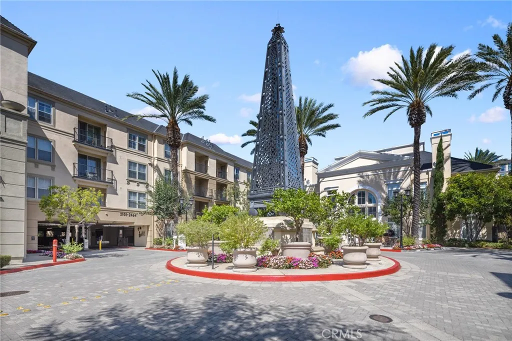 Covered, gated parking space conveys with the home.