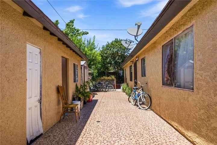 Walkway between unit 2 and garage + studio unit.