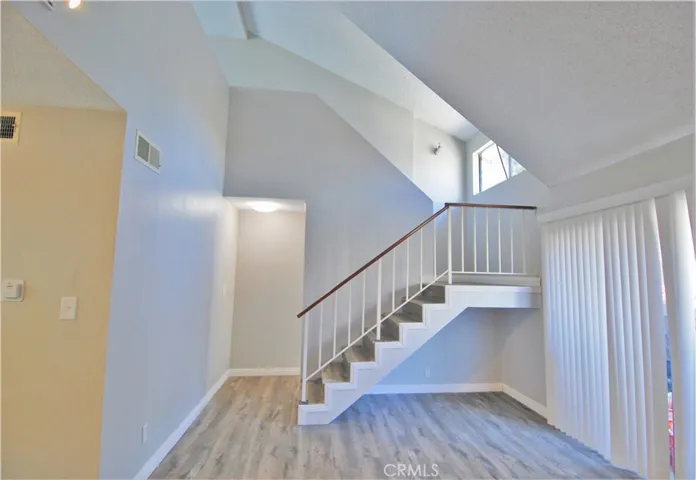 2 Living Rm with staircase leading to upstairs