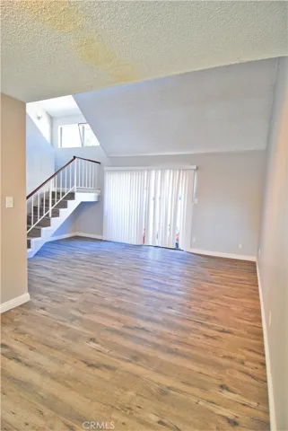 3 Living Rm with glass sliding doors to balcony