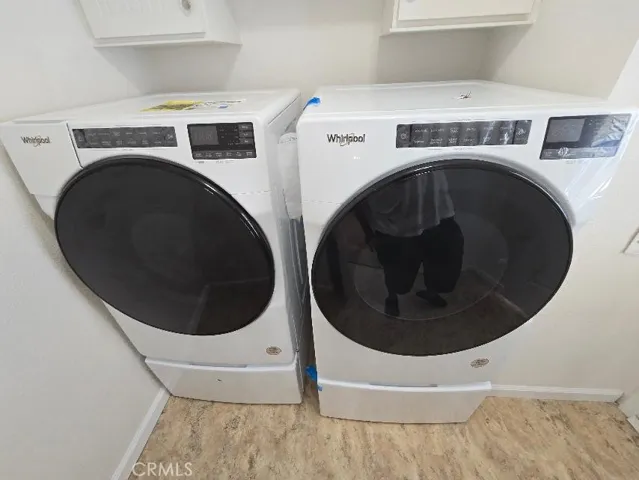 separate laundry room Washer and dryer