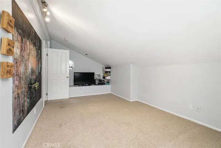 This bonus room could also be a playroom or an extra bedroom
