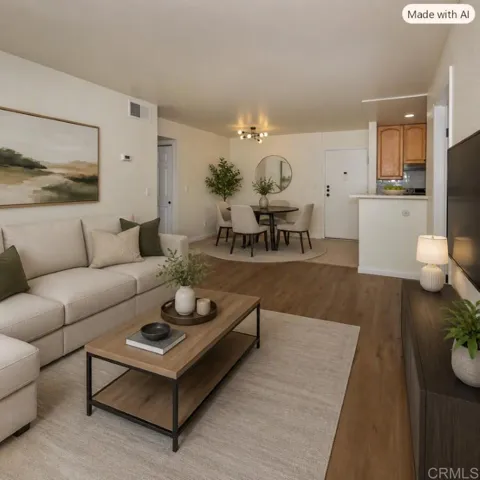 Room has been virtually staged to illustrate potential furnishings and the open-concept layout.