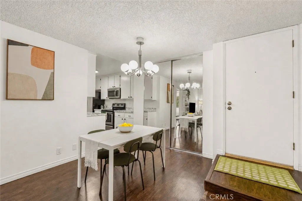 Entryway going towards the dining and kitchen area