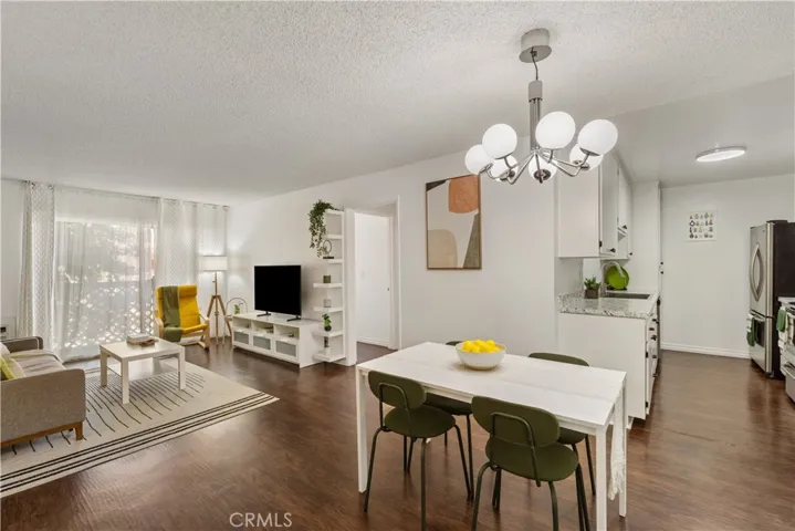 Open living and dining area with kitchen access