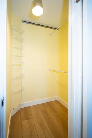 This secondary bedroom has an en-suite bathroom and this walk-in closet.