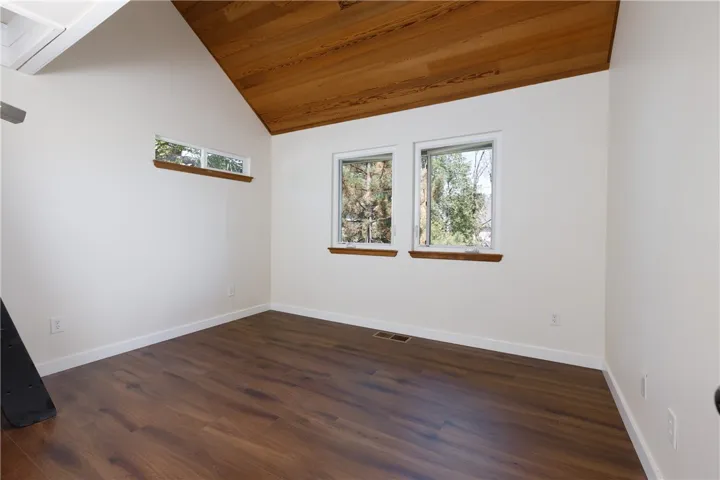 Bedroom One...don't you love that little transom window?