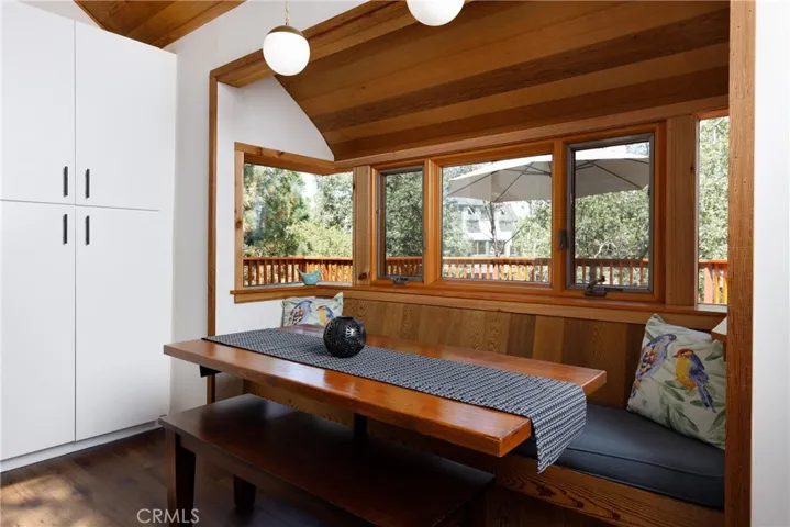 Cozy dining nook plus note all of that storage.