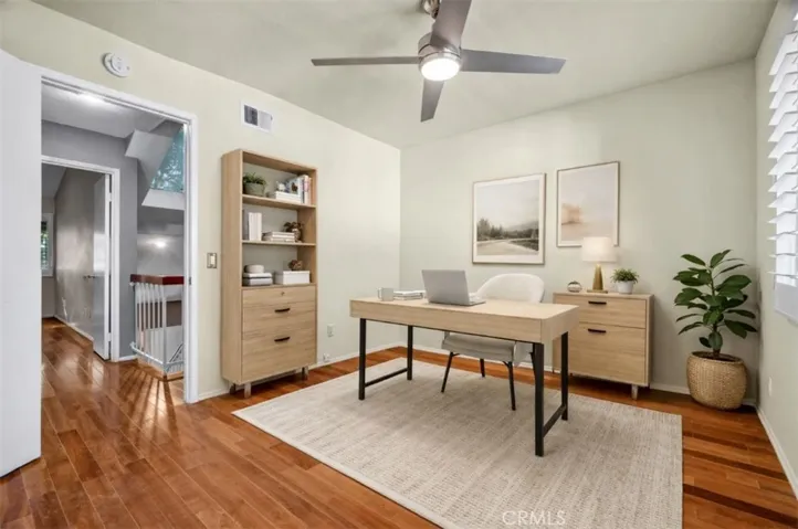 Virtually staged bedroom as an office