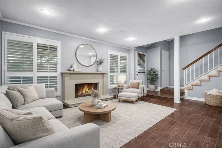 Virtually staged living room with gas fireplace