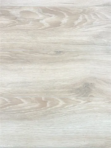 Vinyl Through throughout except for kitchen