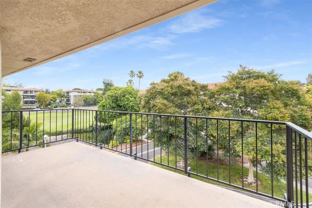 Balcony with Golf Course and Tree Views.