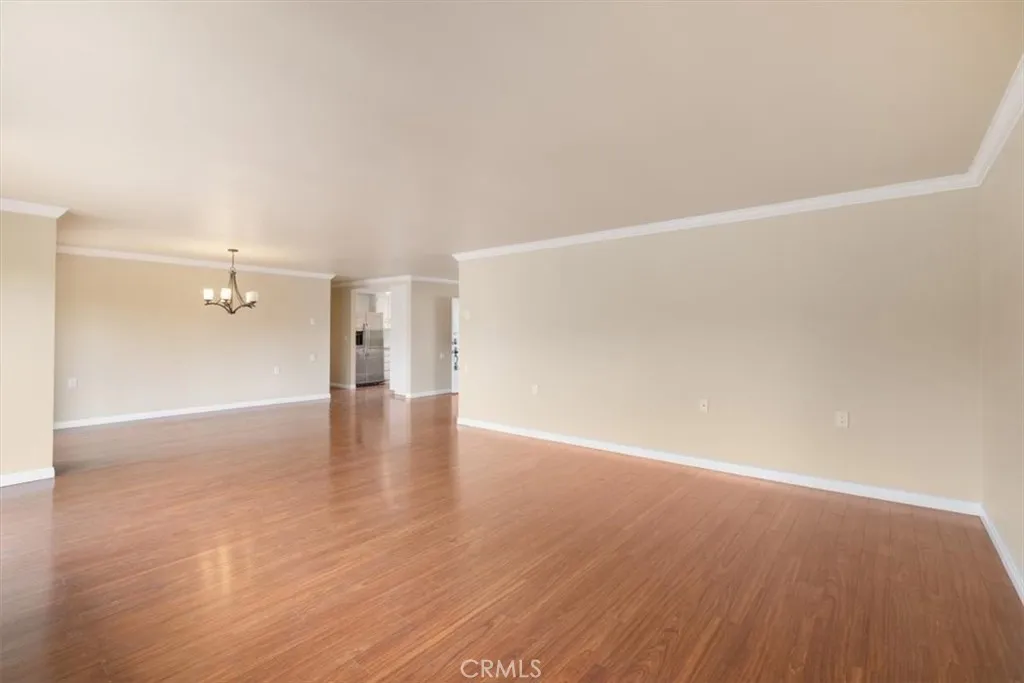 Living and Dining Areas with South Facing Balcony Access.
