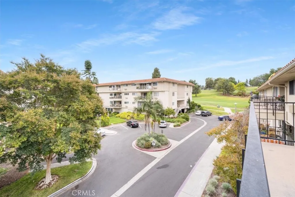 Balcony with Golf Course and Tree Views.