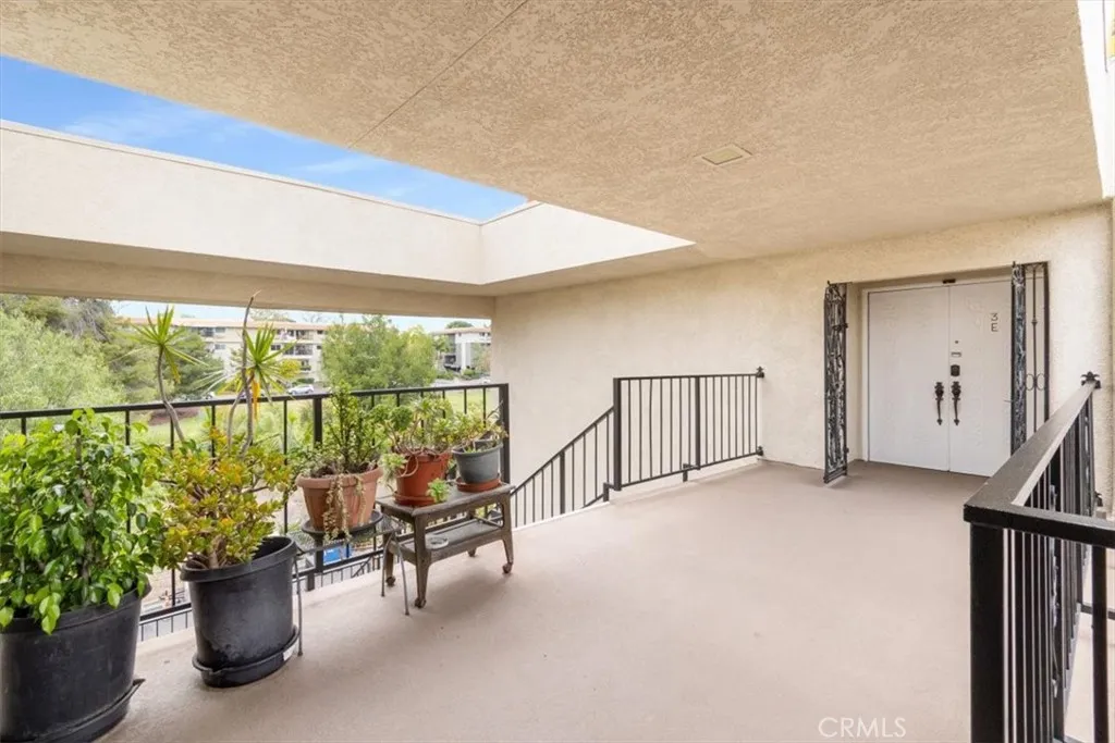 Entry Landing with Privacy Gate and Double Doors.