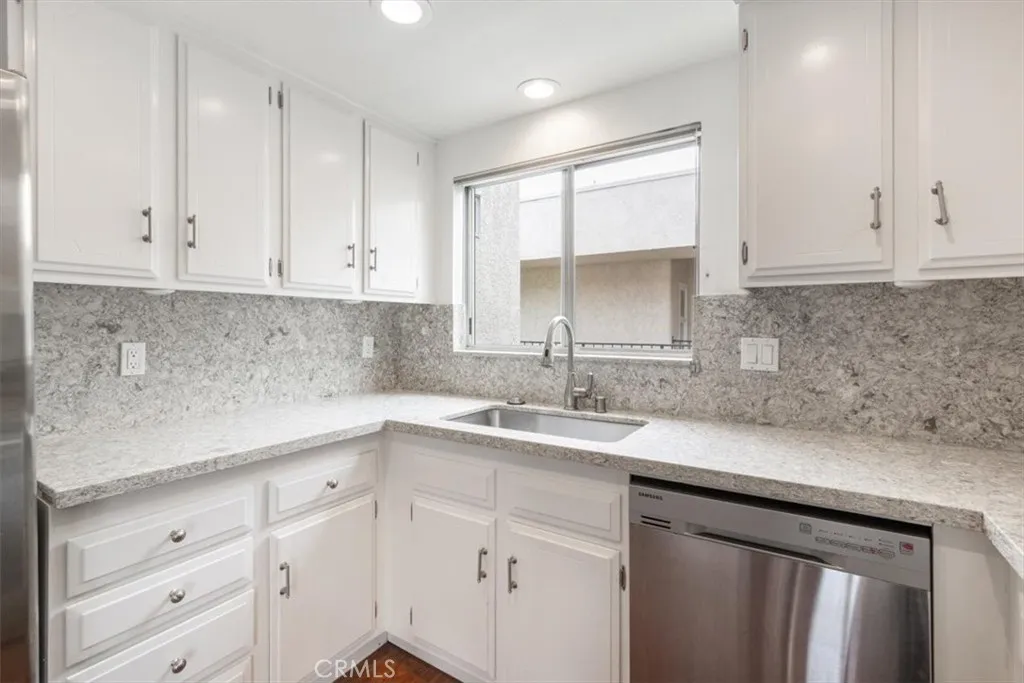 Kitchen off of Dining and Living Areas.