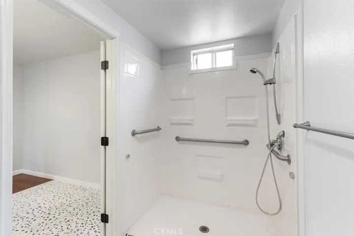 Updated Primary Bathroom with Walk In Shower.