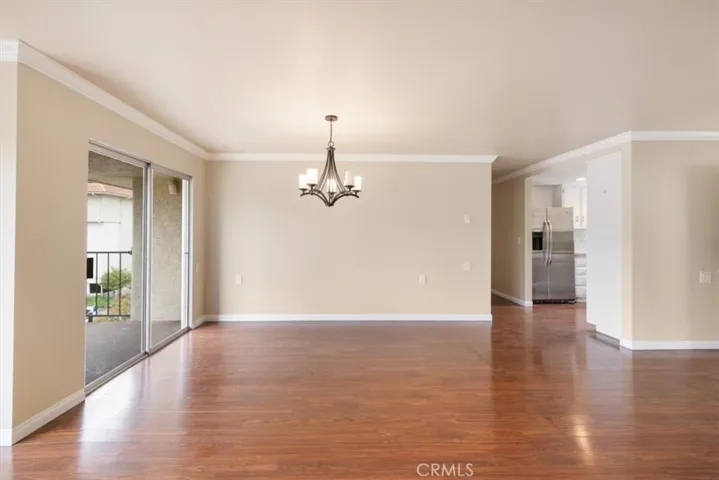 Living and Dining Areas with South Facing Balcony Access.