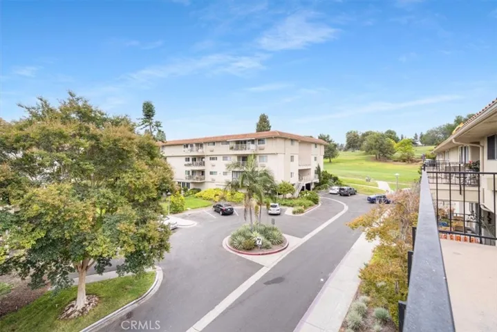 Balcony with Golf Course and Tree Views.
