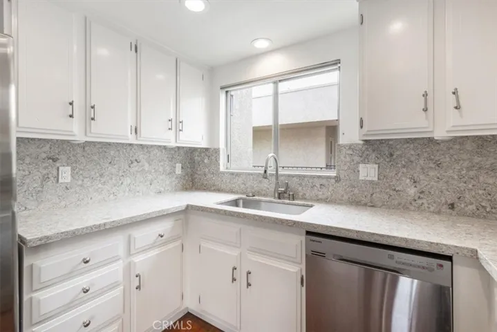 Kitchen off of Dining and Living Areas.