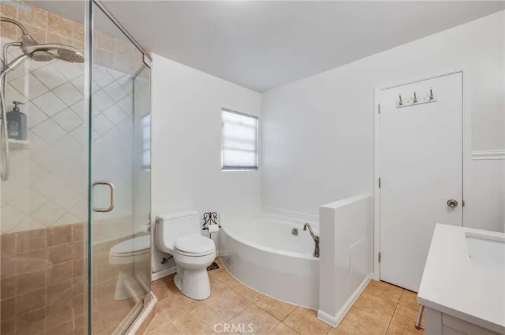 Soaking tub and shower in primary suite