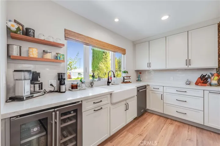 Tons of cabinet space with beverage center