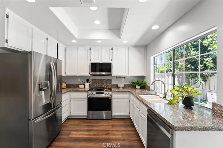 Stainless steel LG smart appliances and Quartz Countertops.