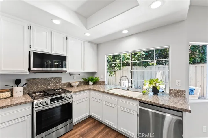 Stainless steel LG smart appliances and Quartz Countertops.
